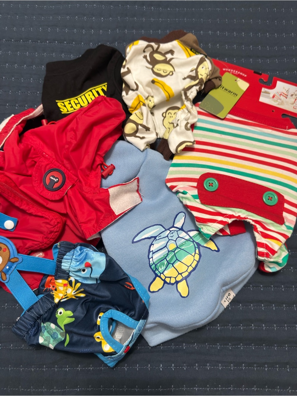 Lot of xs dog clothes.